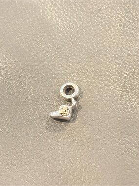 Retired Pandora Silver baby boot Charm with Gold Accent